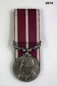 Replica meritorious Service medal mounted.