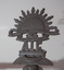 Cast Rising Sun badge on top of the frame for the 38th Battalion banner.