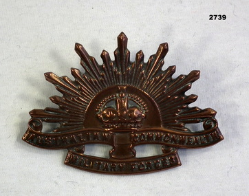 Brass Rising sun badge Australian.