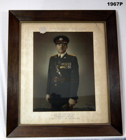 Framed photo of an Officer in full uniform.