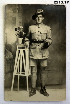 Three black & white photos of a soldier, same person.