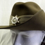 Slouch hat showing opposite side badges.