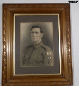Colour enhanced framed portrait WW1 soldier.
