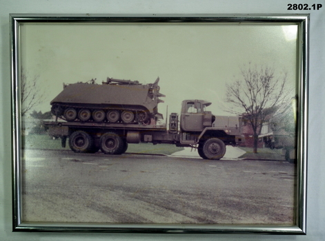 Framed photo of Truck and series of photos.