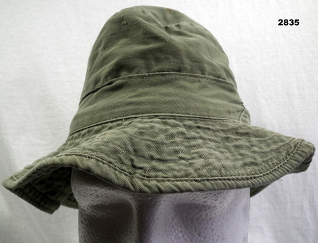 Green cotton floppy Bust hat.