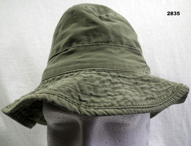 Green cotton floppy Bust hat.