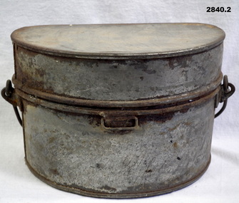 Two piece metal messing pan set.