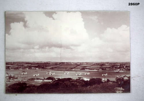 Photograph showing Sunderland aircraft moored.