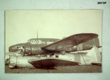 Photograph showing two Avro Ansons crashed.