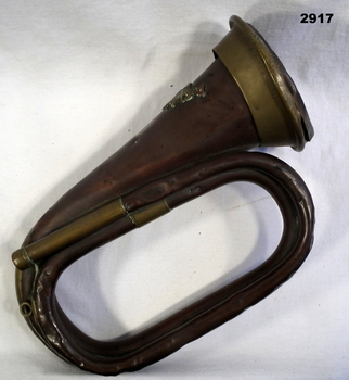 Brass bugle with Rising sun badge WW1.