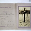 Photographs and memorial of a soldiers grave.