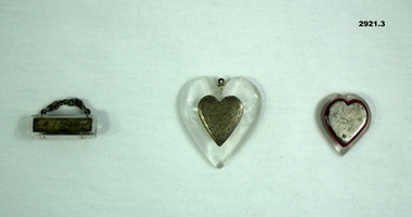 Three badges relating to personal.