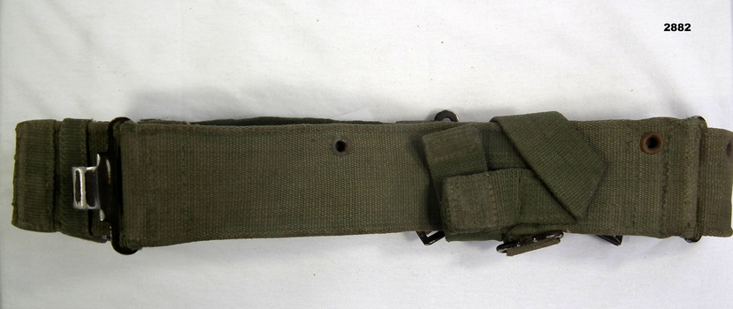 Green coloured modern style webbing belt.