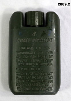 Green plastic insect repellant bottle