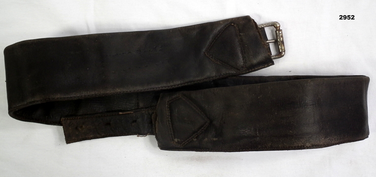 Leather belt of unknown origin.