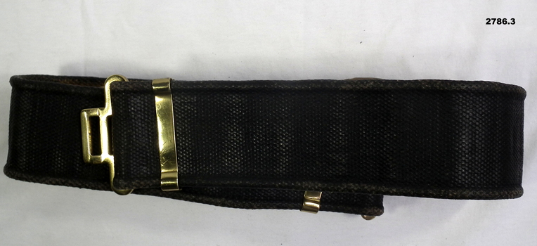 Three webbing belts, black, green, khaki.