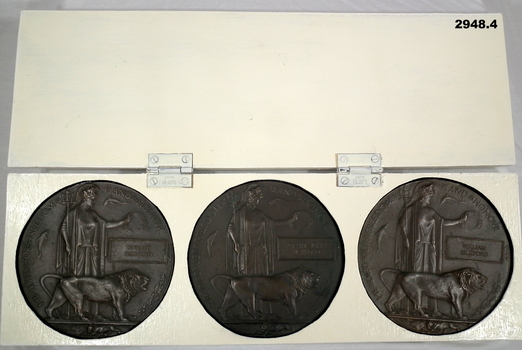 Three Memorial Plaques set in a box WW1.