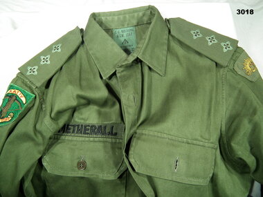 Green cotton army shirt with insignia AATTV