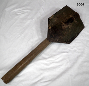 Shovel, fold down entrenching tool.