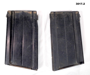 Two black SLR  rifle magazines.