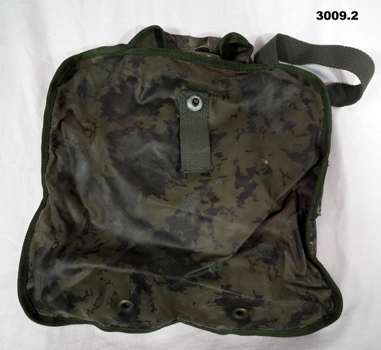 Camouflaged water bag with shoulder strap