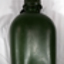 Three green colour plastic water bottles.