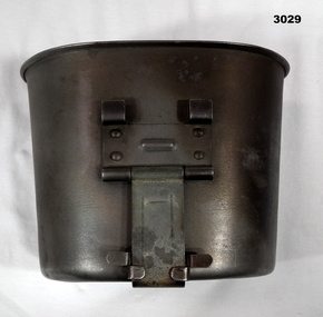Steel kidney shape mug with folding handle.