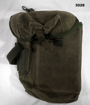 One green colour ammunition basic pouch.