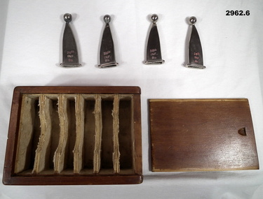 Box with ceremonial bayonet tips in.