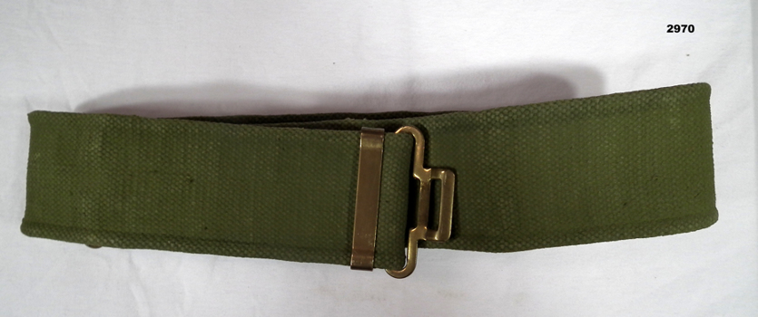 Green coloured standard Army issue webbing belt.