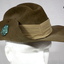 Khaki slouch hat with badge & colour patch.