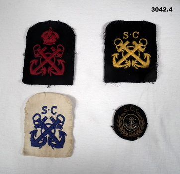 Four cloth badges relating to the Sea Cadets.