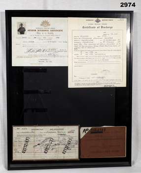 Board with certificates, drivers licence.