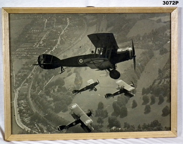 B & W photo showing three aircraft in flight.