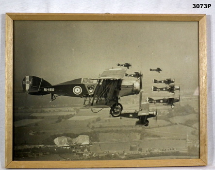 B & W photo of pre WW2 aircraft in flight.