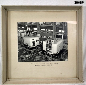 Photograph showing assembly of twin 4.5 Naval guns.