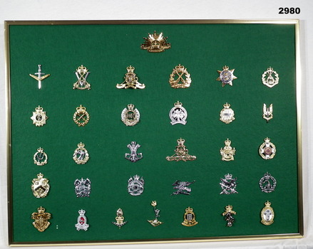 Framed item with Unit badges attached.