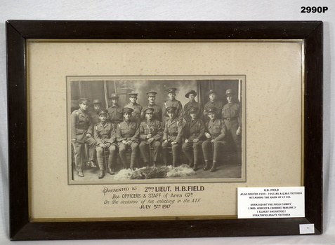 Framed photo showing a group of 67th BN men.