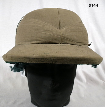 Helmet with hand written names of AIF WW2 soldiers.