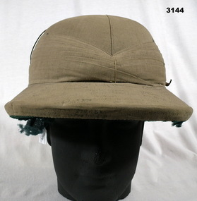 Helmet with hand written names of AIF WW2 soldiers.