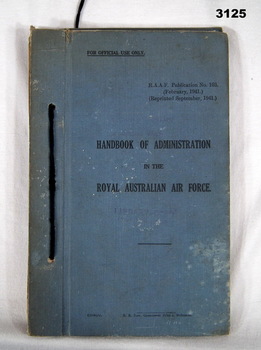 Blue covered RAAF administration book.