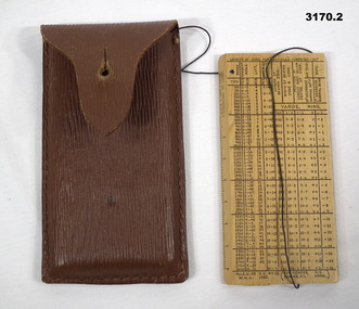 Slide rule relating to the Vickers machine gun..