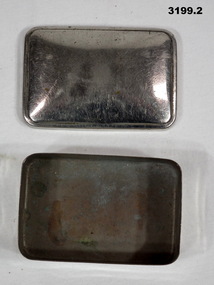 Metal tin that held military items.