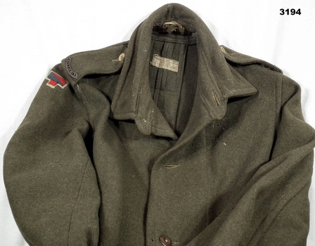 Great coat with colour patch on.