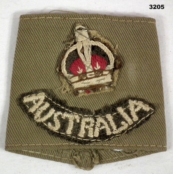 Shoulder epaulette rank insignia.