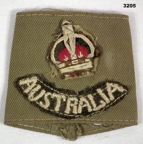 Shoulder epaulette rank insignia.