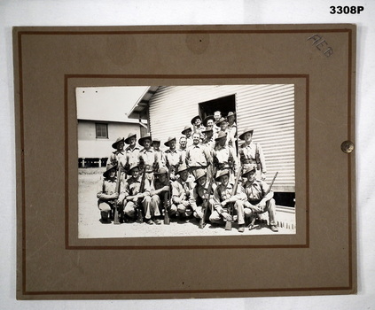 Group of Australian soldiers outside a hut
