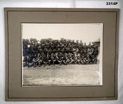 Photograph of L.H troops in group photo.