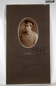 Sepia tone oval photo of a WW1 soldier.