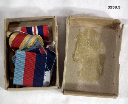 Medals, ribbons, container AIF WW2